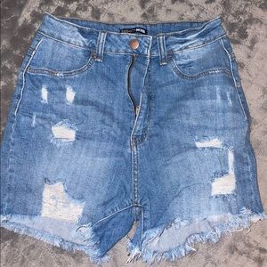 Distressed denim shorts
